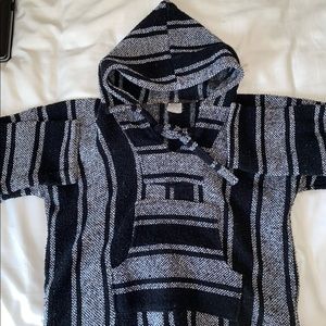 Poncho, keeps me very warm tbh